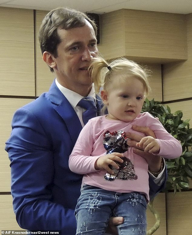 Dr Popov showed journalists a small Russian girl whose birthmark he has removed