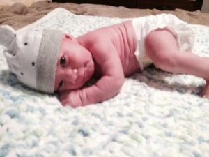 2 week old doing tummy time